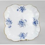NANTGARW PORCELAIN LOBED SQUARE DISH painted in blue with sprays of flowers and with gilt rim,