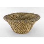 CARDIGANSHIRE LIP-WORK CIRCULAR BASKET of tapered form, traditionally crafted from wheat straw coils