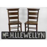ITEMS RELATING TO LT COL SIR HARRY LLEWELLYN CBE comprising a pair of oak chapel chairs from his