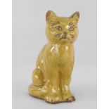 EWENNY POTTERY MODEL OF A SEATED CAT in mustard glaze, incised decoration, untitled, inscribed to