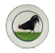 A LLANELLY POTTERY PLATE painted with single strutting black cock on grass, 20cms diam Condition