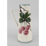 A LLANELLY POTTERY SINGLE-HANDLED SPILL VASE of tapering form, painted with wild-cherries, 15.