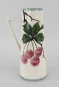 A LLANELLY POTTERY SINGLE-HANDLED SPILL VASE of tapering form, painted with wild-cherries, 15.