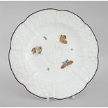 A NANTGARW PORCELAIN CRUCIFORM PLATE WITH DAISY MOULDING decorated with insects within the chocolate