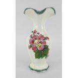 A SMALL LLANELLY POTTERY SPILL VASE with faceted body and shaped neck, painted with briar-roses,