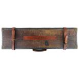 AN EARLY 20TH CENTURY SHOTGUN CASE oak lined with leather exterior and brass corner mounts, external