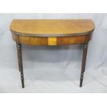 REGENCY MAHOGANY FOLD-OVER TEA TABLE with central walnut block on turned and reeded supports, 71.