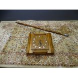 OAK ART DECO WALL CLOCK, vintage walking cane and a small modern rug