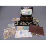 BRITISH, OVERSEAS BANK NOTES, coinage and crowns contained in a Japanned cash tin and leather