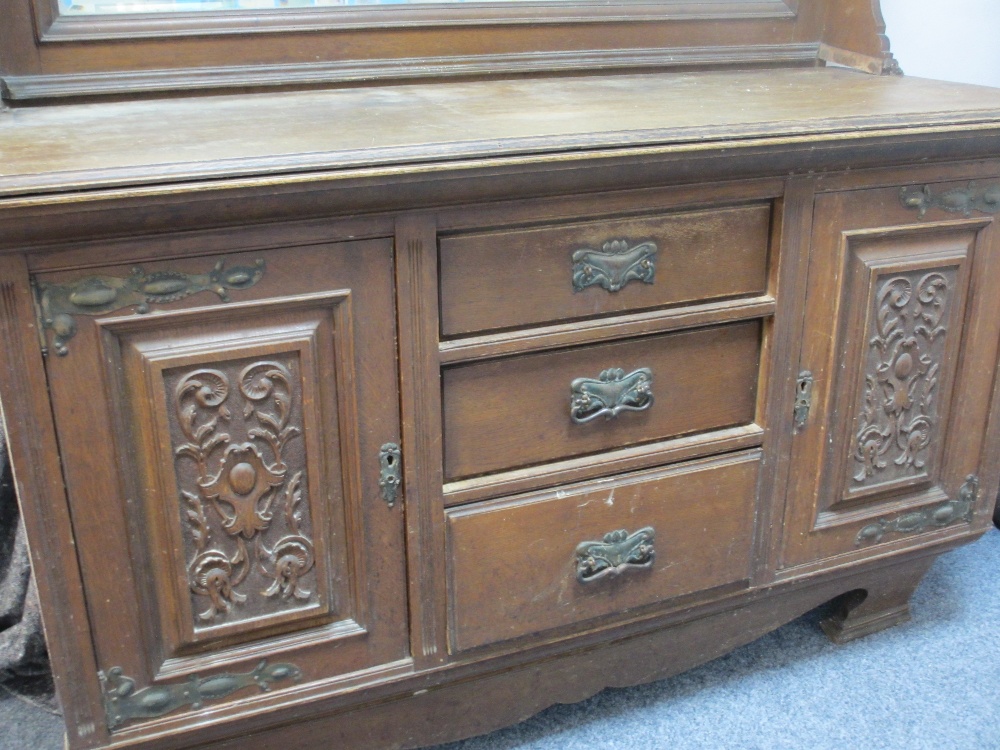 OAK MIRROR BACK SIDEBOARD, circa 1900, having twin cupboard top with central mirrored shelf over a - Image 3 of 3