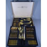 BESTECKE SOLINGN SBS 23/24 KARAT GOLD PLATED CUTLERY in fitted attache type case, 70 pieces, in