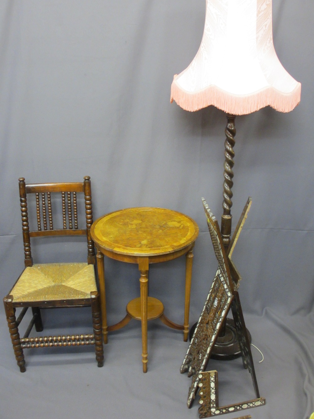 FOUR VINTAGE FURNITURE ITEMS including a circular top two-tier walnut side table, an oak barley