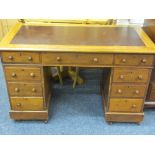 LATE VICTORIAN MAHOGANY TWIN PEDESTAL DESK the top having rexine insert over an arrangement of