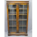VINTAGE OAK BOOKCASE with twin leaded glass doors and fixed interior shelves, 135cms H, 81cms W,