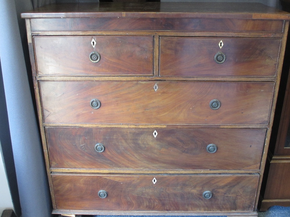 VICTORIAN MAHOGANY CHEST of two short over three long drawers, having ring pull handles and ivory