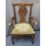 ANTIQUE MAHOGANY CHIPPENDALE STYLE ARMCHAIR with pierced scroll carved back, shaped and swept arms