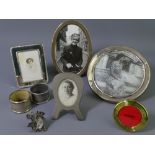 THREE HALLMARKED & STERLING SILVER PHOTOGRAPH FRAMES along with three others, a silver napkin ring