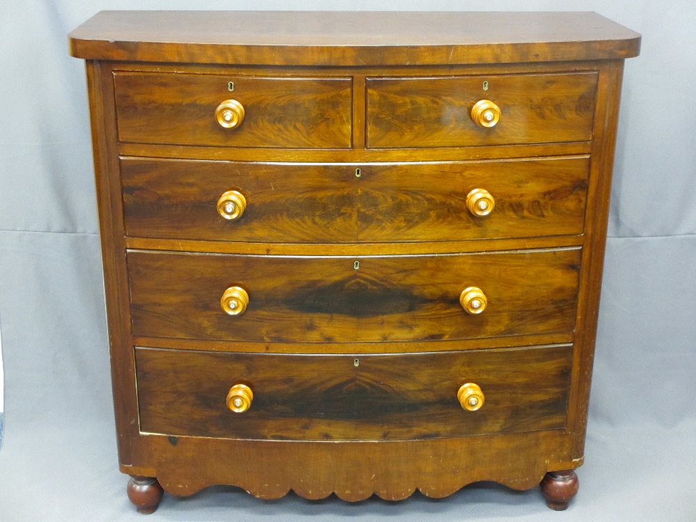 VICTORIAN MAHOGANY BOW FRONT CHEST of two short over three long drawers, all having turned wooden