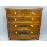VICTORIAN MAHOGANY BOW FRONT CHEST of two short over three long drawers, all having turned wooden