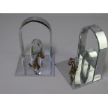 ART DECO CHROME & BRONZE BOOKENDS, a pair, double arched form on a platform base with stylized