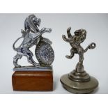 VINTAGE CAR MASCOTS X 2 - RAMPANT LIONS to include a possibly GILBERT & SON with shield "Justice