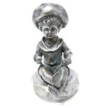 VINTAGE CAR ACCESSORY MASCOT- YOUNG SEATED BOY wearing a hat and holding a ball, 9cms H.