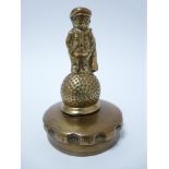 VINTAGE CAR MASCOT-DUNLOP GOLF CADDY figure standing on a Dunlop 31 stamped golf ball, circa