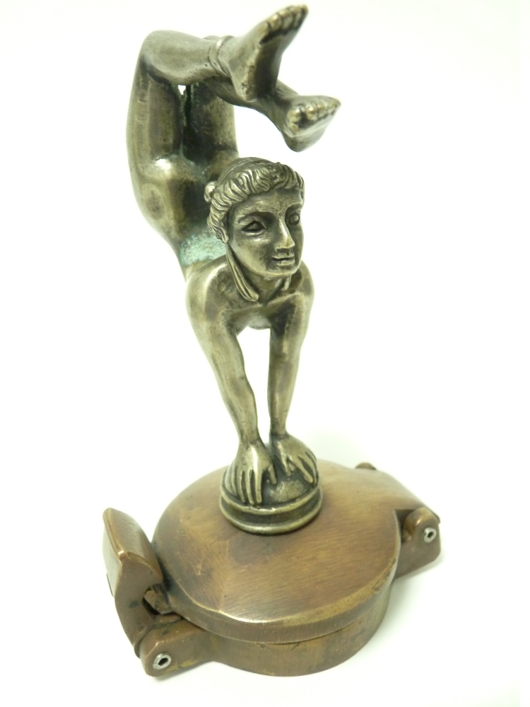 VINTAGE CAR MASCOT-CONTORTIONIST after E Carlier, French, bears signature, 13cms H.