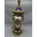 TABLE LAMP. Continental porcelain and ormolu, deep blue ground with ribbon and scrolled handles