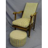 AN ADJUSTABLE RETRO STYLE WOODEN ARMED CHAIR with pouffe stool.