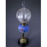 OIL LAMP on brass Corinthian column with floral painted blue reservoir and etched glass shade