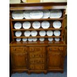 WELSH DRESSER. LATE 9TH CENTURY PINE AND MAHOGANY with 3-shelf rack over a breakfront base of 3 open