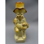 EARLY SALT GLAZED ENGLISH TOBY JUG, seated, one-armed drinking figure with top hat lid, 30 cms