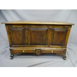 A 'COFFER BACH' - reproduction miniature chest with hinged lid and 3-panelled front with 2 narrow