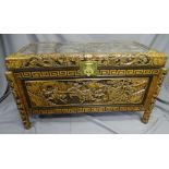 ORIENTAL CAMPHORWOOD BLANKET CHEST, heavily carved all round and with interior sliding tray and