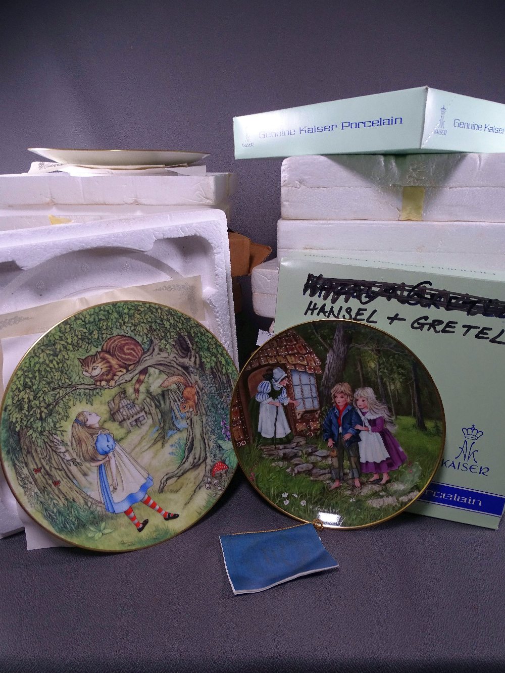 A LARGE PARCEL OF BOXED DISPLAY PLATES including fairytale themed