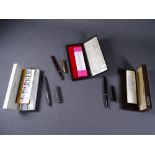 PARKER - Two vintage (late 1960s) Parker 45 Deluxe fountain pens, one grey, one black, both with