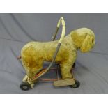 A TRIANG CHILD 'S PUSH-ALONG DOG on 4 wheels (ready for restoration)