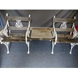 ANTIQUE GARDEN SEATING. A wood and metal garden tete a tete twin chair set with attractive fruit and