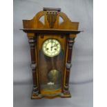A VIENNA WALL CLOCK-neat mahogany cased with brass pendulum and movement initialled CB. 87 cms high