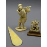 ANTIQUE IVORY FIGURES , a fisherman carrying a basket of fish, George and the dragon on a wooden