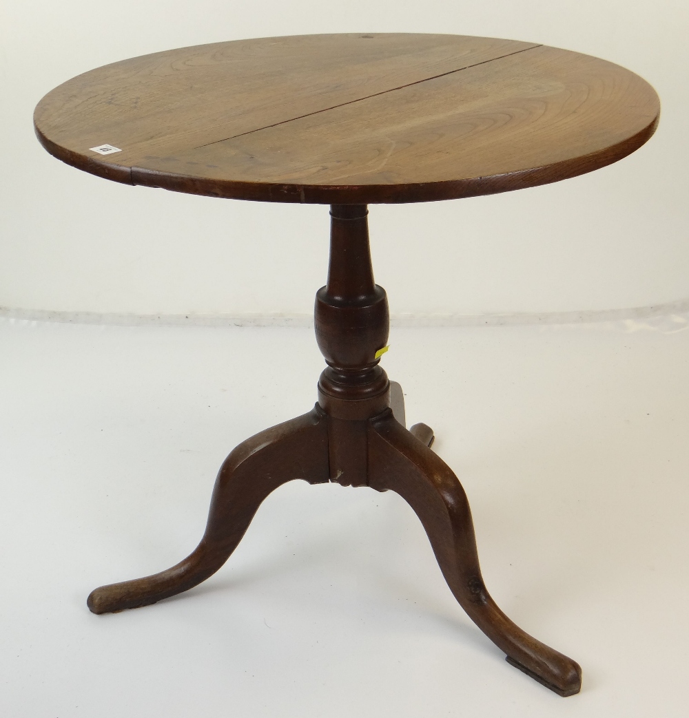 19TH CENTURY OAK CIRCULAR TILT-TOP TRIPOD TABLE, 75cms diameter Condition Report: top shrunk, one