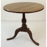 19TH CENTURY OAK CIRCULAR TILT-TOP TRIPOD TABLE, 75cms diameter Condition Report: top shrunk, one