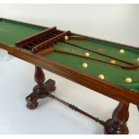 VICTORIAN MAHOGANY BAGATELLE TABLE having a folding top opening to reveal a baize-lined playing