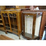 VINTAGE WALNUT TWO-DOOR GLAZED BOOKCASE on ball and claw supports, and a fancy china cabinet (2)