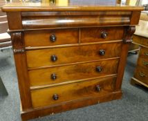 VICTORIAN MAHOGANY CHEST of three long and two short drawers, cushion moulded frieze drawer,