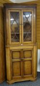 GOOD 19TH CENTURY WELSH OAK FARMHOUSE CORNER CUPBOARD the blind two-door cupboard base having