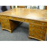 LARGE VICTORIAN STYLE WALNUT PARTNER'S DESK having two banks of flanking four graduated drawers to a
