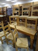 FARMHOUSE PINE KITCHEN TABLE with six matching rush seated, ladder back chairs