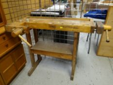 A SJOBERGS (SWEDEN) LIGHTWOOD CARPENTERS WORK TABLE with intergral vice, 111cms wide